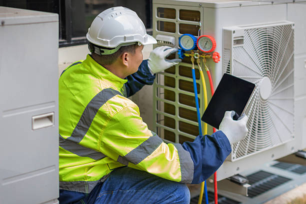 Professional Hvac technician working in Marshfield Hills, MA